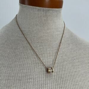 Gold plated paved rhinestone spinners necklace